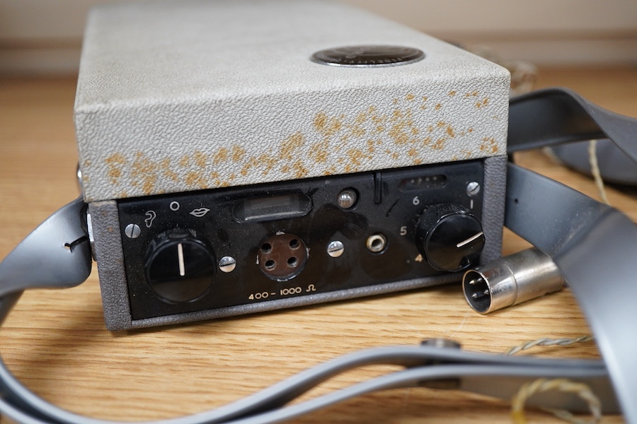 A late 1950s portable 9v battery powered reel-to-reel FI-Cord 1A, ‘Fidelity Recording’, as used by BBC reporters, with original vinyl strap and earphone